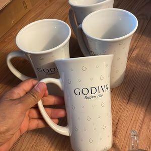4 tall mugs  godiva belgium 1926